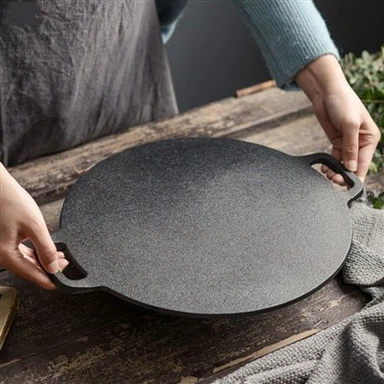 Traditionell gjutjärnsstekpanna